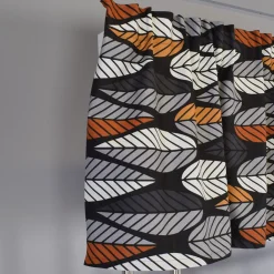 Gardinkappor Mönstrade<Arvidssons textil Blader svart-orange gardinkappa metervara