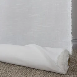 Gardintyger Enfärgade<Nordisk Textil Hotellgardin Tilda vit tyg metervara med tyngdband 280cm