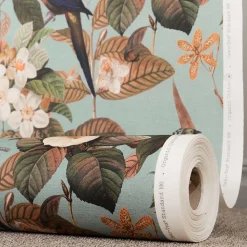 Gardintyger Mönstrade< Philodendron tyg - turkost med tropiska fåglar och blommor